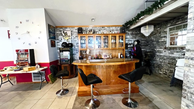 bar with light tile patterned floors