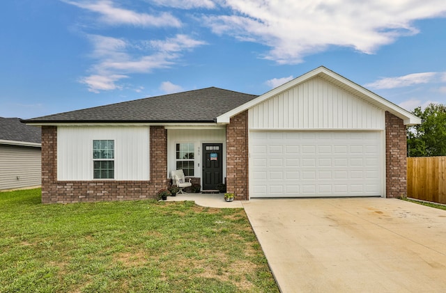 single story home featuring a front yard and a garage