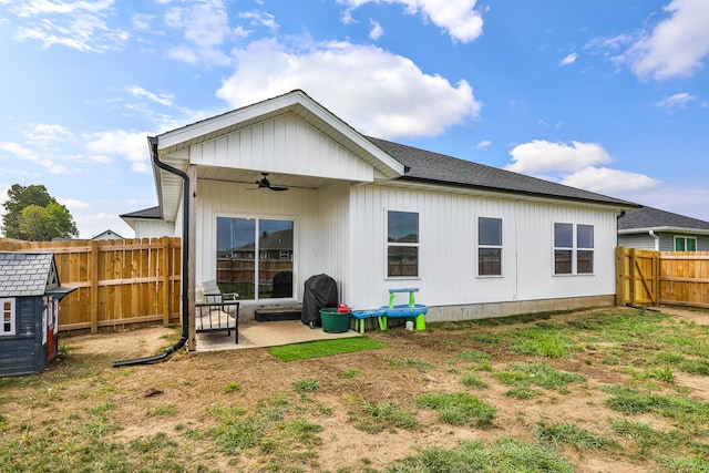 back of property featuring ceiling fan and a patio area