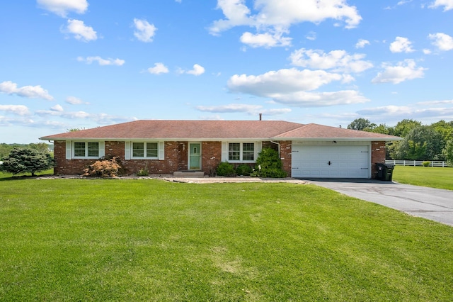 single story home with a front lawn and a garage