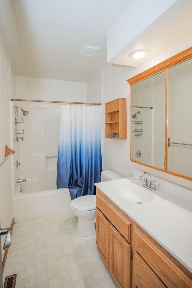 full bathroom featuring vanity, shower / tub combo, and toilet