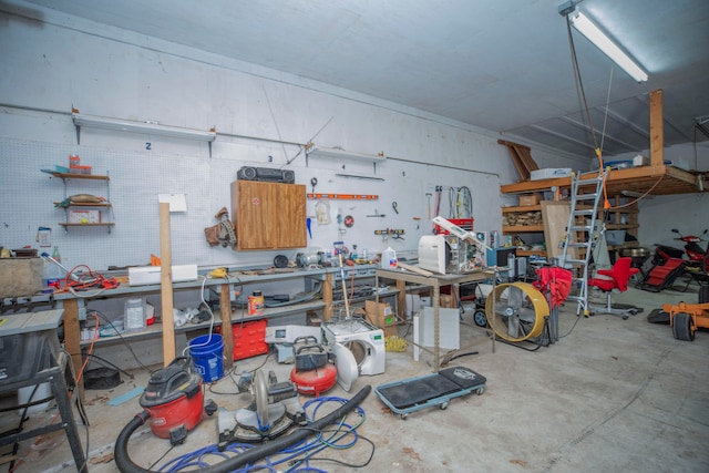 garage featuring a workshop area