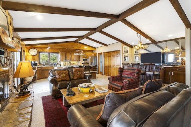 living room with vaulted ceiling with beams and an inviting chandelier