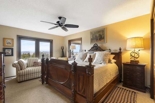 91 Blueview Ln, Kimberling City, MO 65686 - bedroom featuring ceiling fan, a textured ceiling, and light carpet