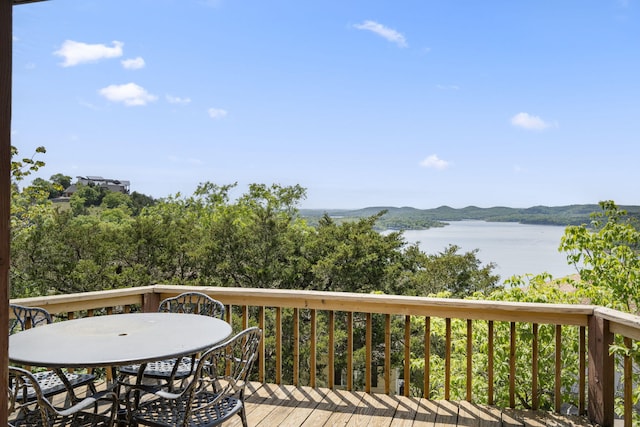 91 Blueview Ln, Kimberling City, MO 65686 - wooden terrace featuring a water view and outdoor dining space