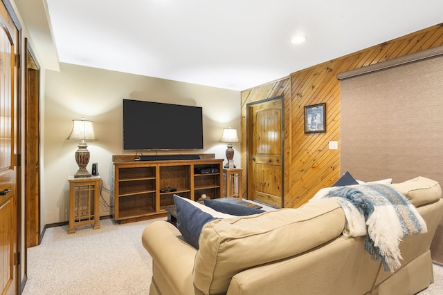 91 Blueview Ln, Kimberling City, MO 65686 - living room featuring baseboards, wood walls, recessed lighting, and light colored carpet
