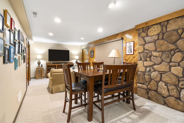 91 Blueview Ln, Kimberling City, MO 65686 - dining area featuring light colored carpet, wooden walls, visible vents, and recessed lighting