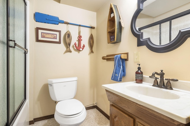 full bath with toilet, enclosed tub / shower combo, vanity, baseboards, and speckled floor