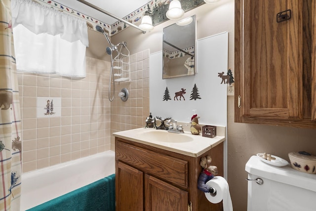 bathroom featuring shower / bath combo with shower curtain, toilet, and vanity