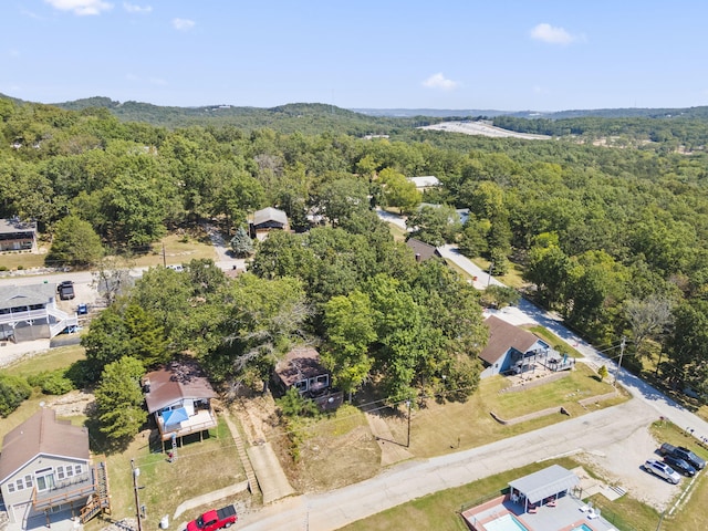 aerial view with a wooded view