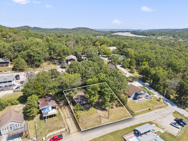 drone / aerial view with a view of trees