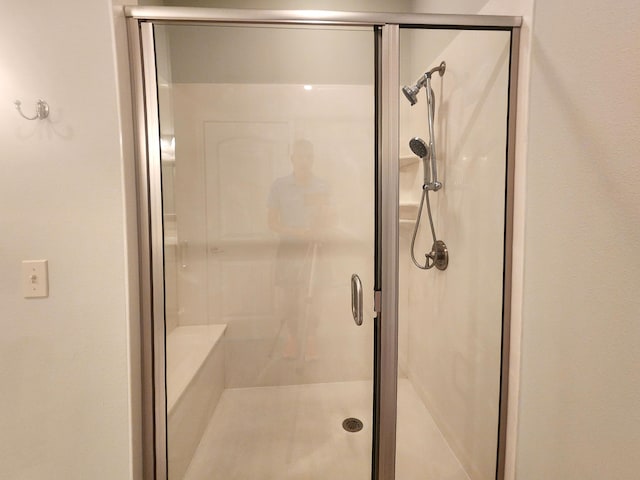 full bathroom featuring a shower stall