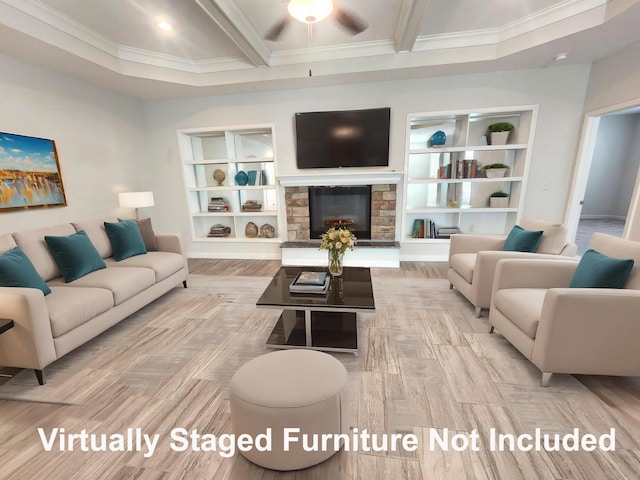 living room with wood finished floors, beam ceiling, crown molding, a fireplace, and built in shelves