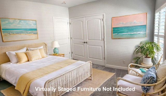 bedroom featuring a closet and baseboards
