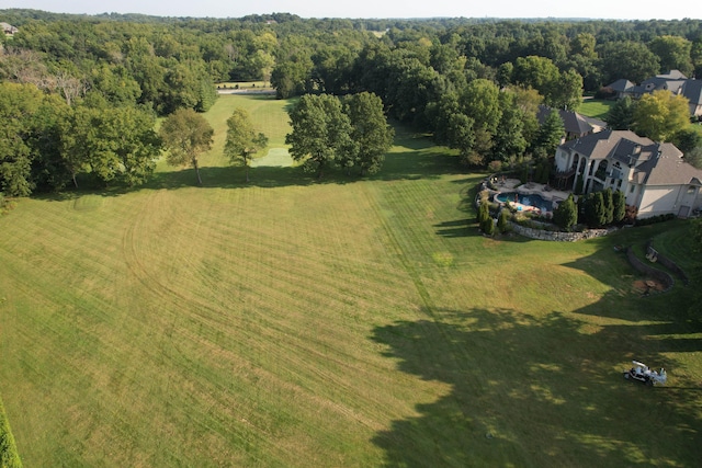 birds eye view of property featuring a rural view