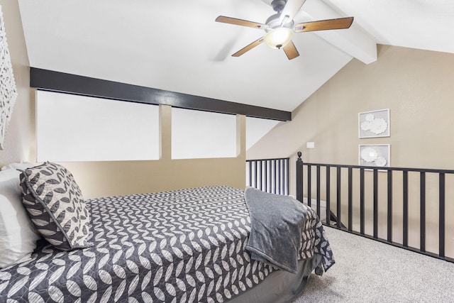 bedroom featuring carpet, vaulted ceiling with beams, and ceiling fan