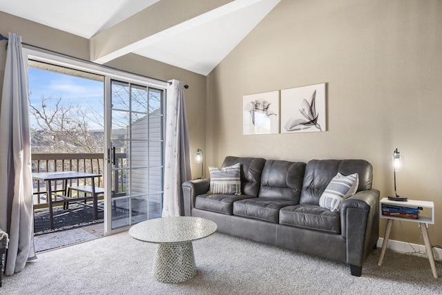 living room featuring carpet floors and vaulted ceiling with beams