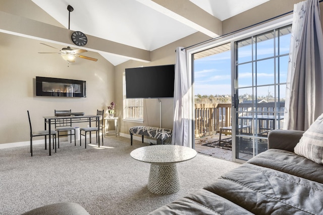 carpeted living room featuring ceiling fan, a healthy amount of sunlight, and vaulted ceiling with beams