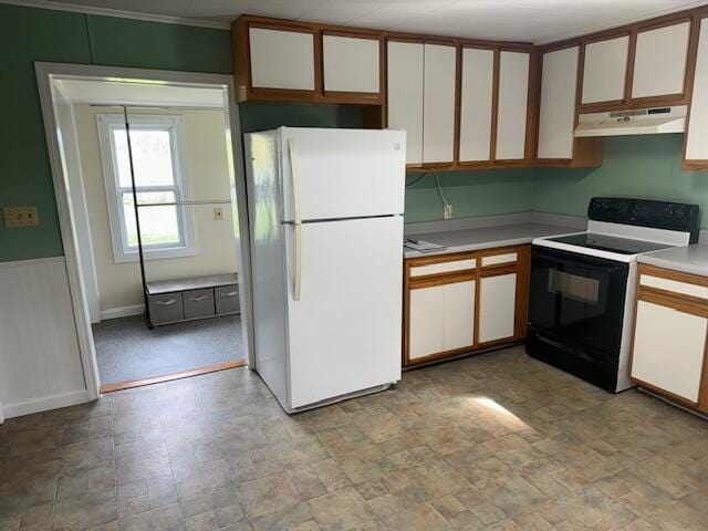 kitchen with ornamental molding, white appliances, and white cabinetry