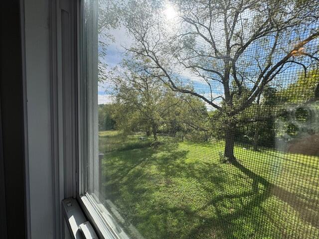 view of yard featuring a balcony