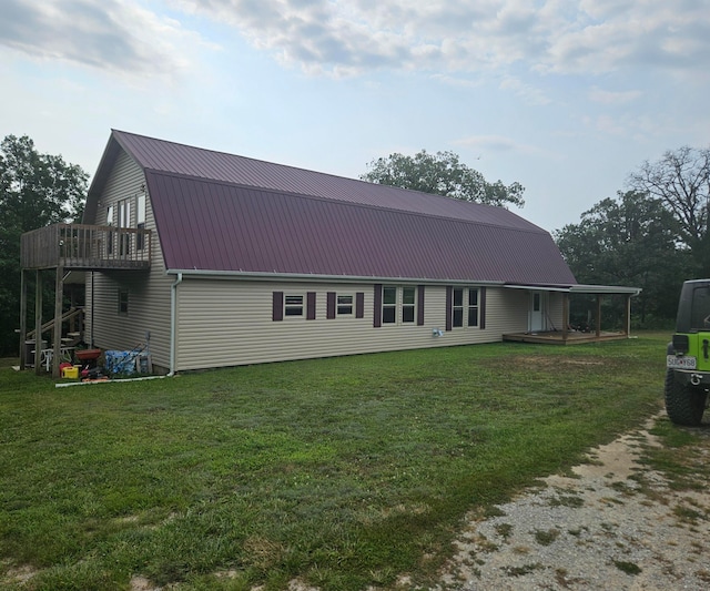 view of home's exterior with a yard