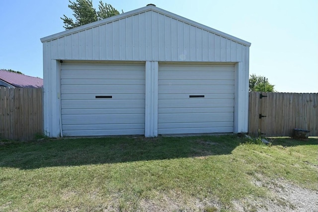 detached garage with fence