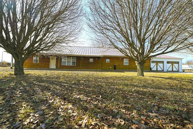 exterior space featuring a detached garage