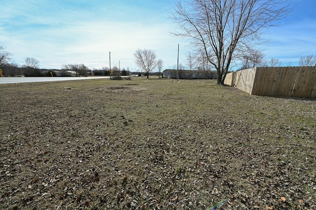 view of yard featuring fence