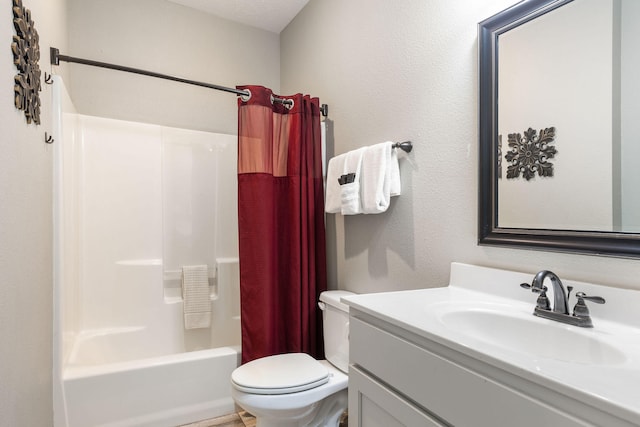 full bathroom with vanity, shower / bath combo with shower curtain, toilet, and a textured ceiling