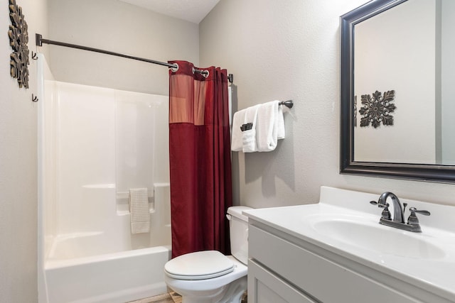 full bath featuring shower / bath combo with shower curtain, vanity, and toilet