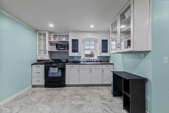 kitchen featuring backsplash, black electric range oven, sink, and white cabinets