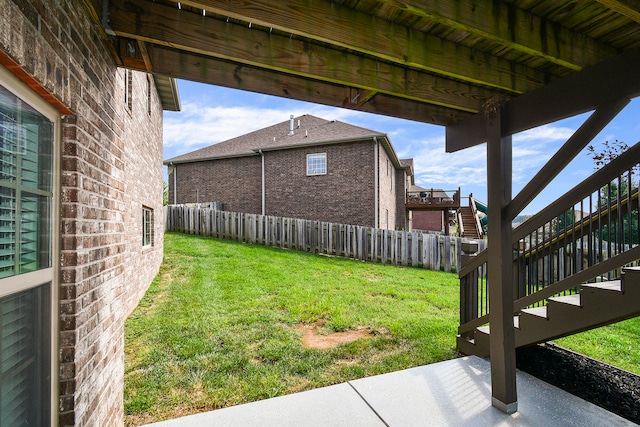 view of yard featuring a deck