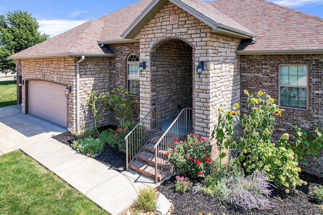 view of front of property with a garage