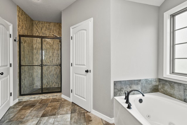 bathroom with independent shower and bath