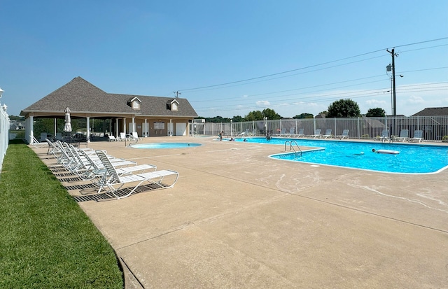 view of swimming pool featuring a patio