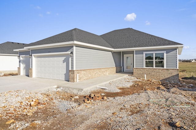 single story home with a garage