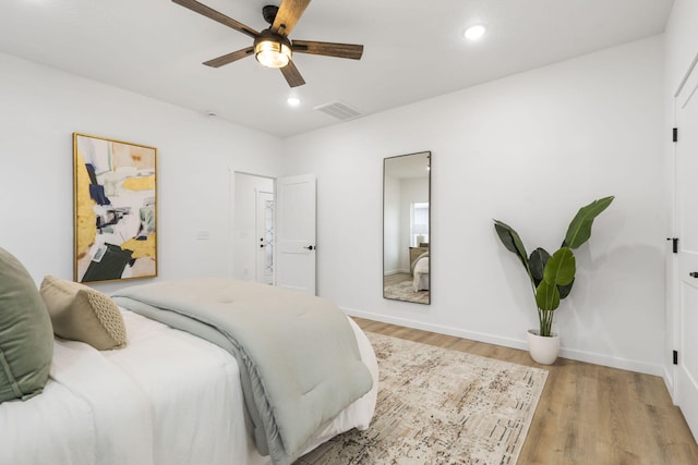 bedroom with visible vents, baseboards, light wood-style flooring, ceiling fan, and recessed lighting