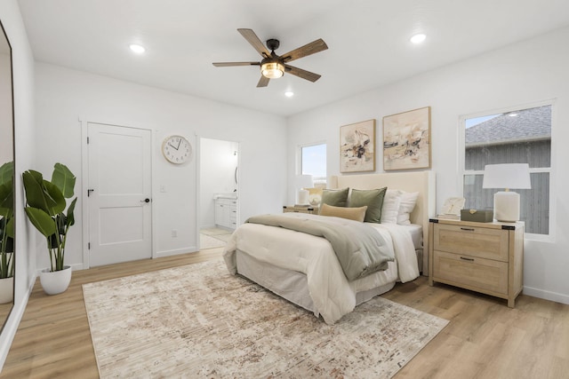 bedroom featuring light wood-style flooring and recessed lighting