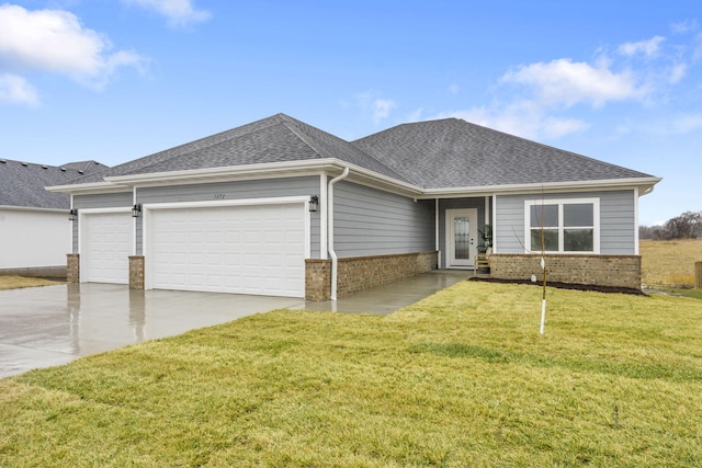 ranch-style house with driveway, a shingled roof, an attached garage, a front lawn, and brick siding