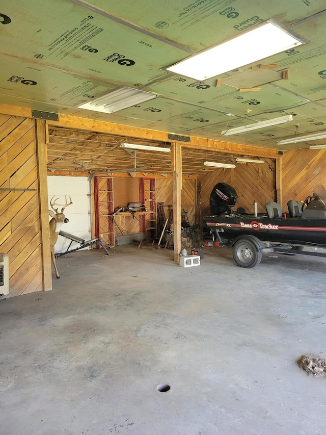 garage with wood walls