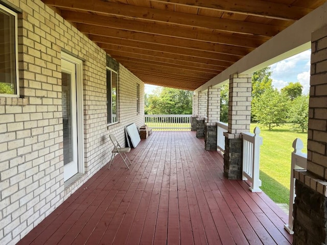 deck featuring a yard