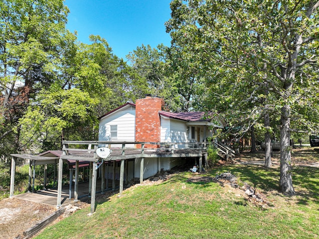 view of yard with a wooden deck