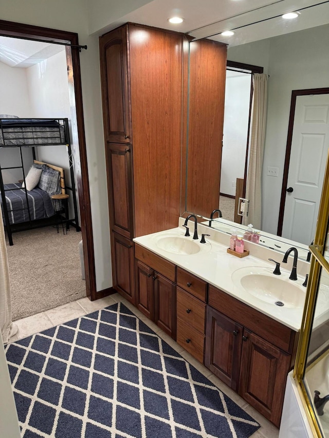 bathroom with vanity and walk in shower