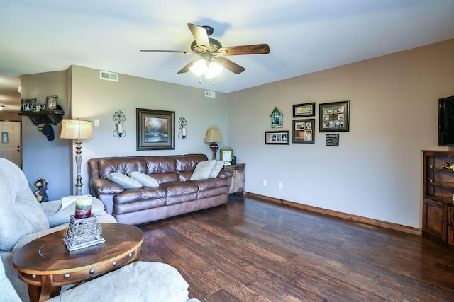 living room with wood finished floors, baseboards, a ceiling fan, and visible vents