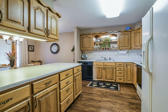 kitchen featuring a chandelier, dark wood-type flooring, electric range, white fridge with ice dispenser, and black dishwasher