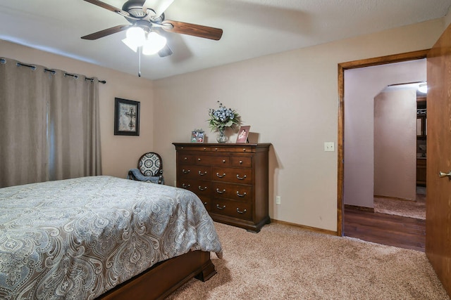 bedroom featuring ceiling fan and light wood-type flooring