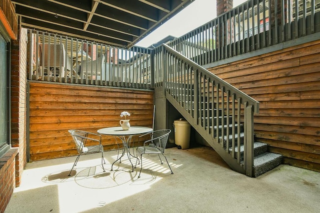 view of patio / terrace featuring stairway