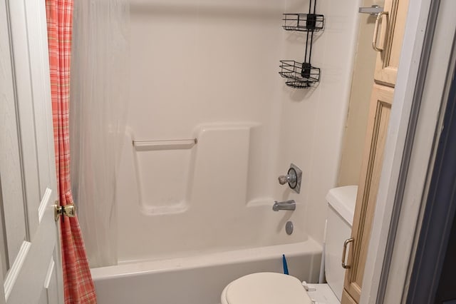 full bathroom featuring vanity, shower / tub combo, and toilet