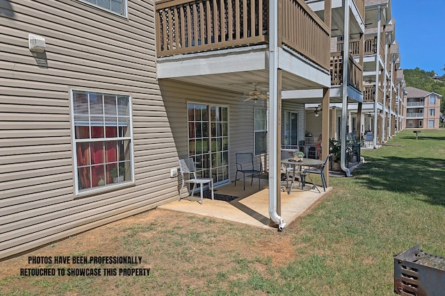 exterior space with a yard, a balcony, and a patio area