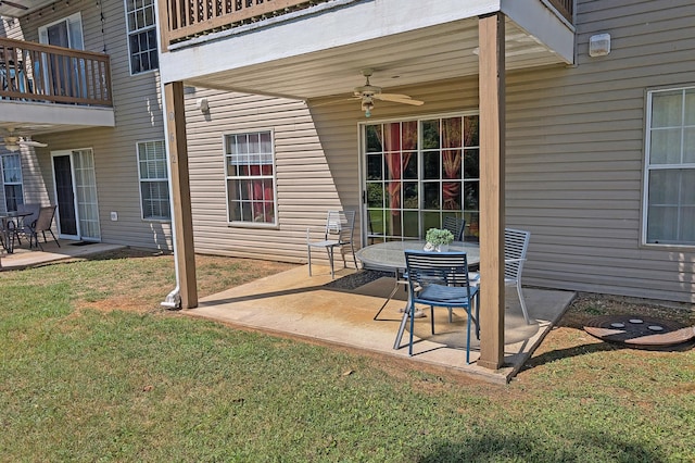 view of patio featuring a balcony and ceiling fan